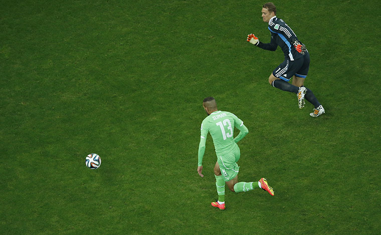 Algeria's forward Islam Slimani with Manuel Neuer