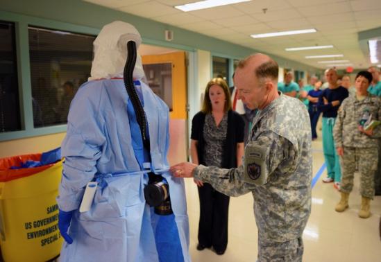 U.S. Army General Charles H. Jacoby Jr. observes an instructor during the Department of Defense medical support team training at the San Antonio Military Medical Center