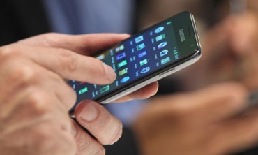 Someone using a Samsung Galaaxy smartphone