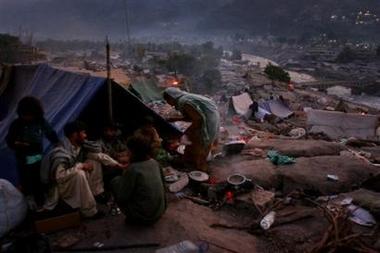 Pakistani survivors having dinner