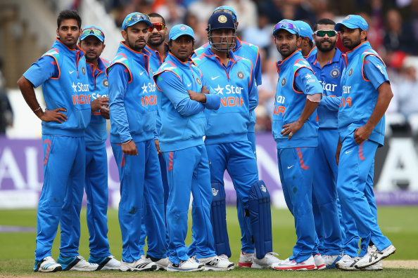 NOTTINGHAM, ENGLAND - AUGUST 30: The Indian team wait for a review decision for the wicket of Joe Root during the third Royal London One-Day Series match between England and India at Trent Bridge on August 30, 2014 in Nottingham, England. (Photo by Michael Steele/Getty Images)