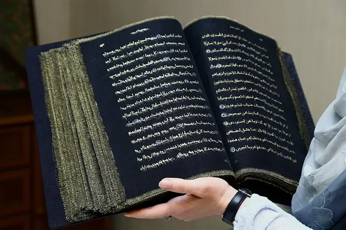 Silk quran gold