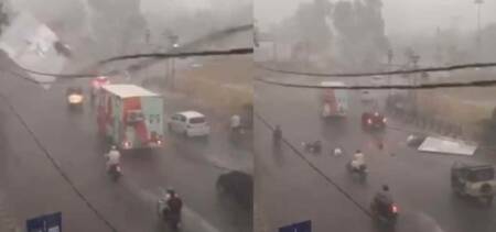billboard falls rains karachi