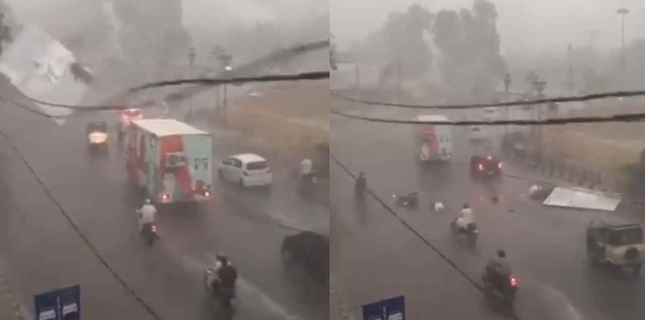billboard falls rains karachi