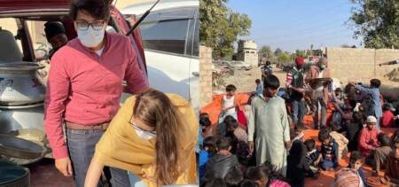 newlywed couple feeding needy reception pakistan