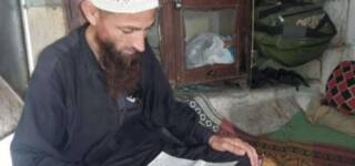 Bannu Man Masters Degrees