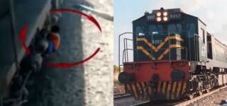 boy stealing brake form moving train
