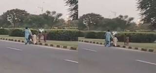man teaches wife motorbike