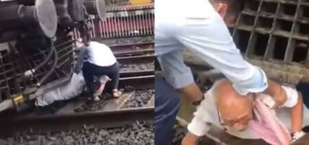 man survives under train