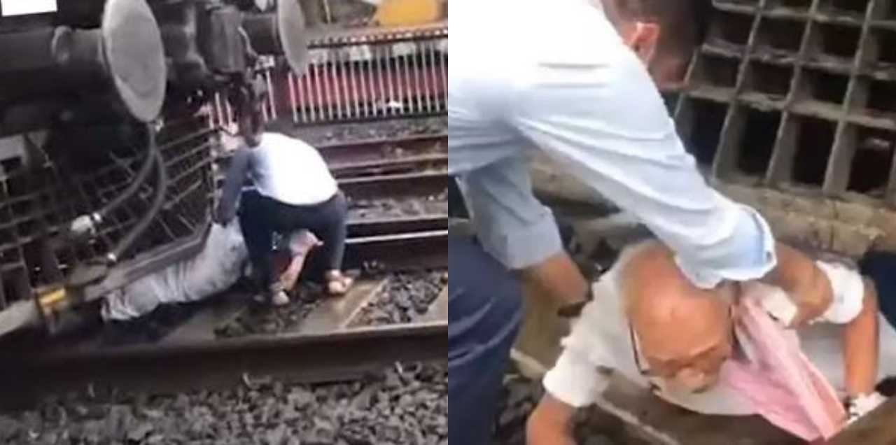 man survives under train