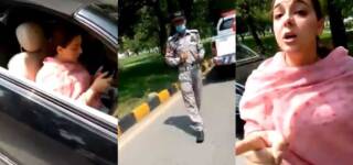 woman misbehaves with cop in islamabad