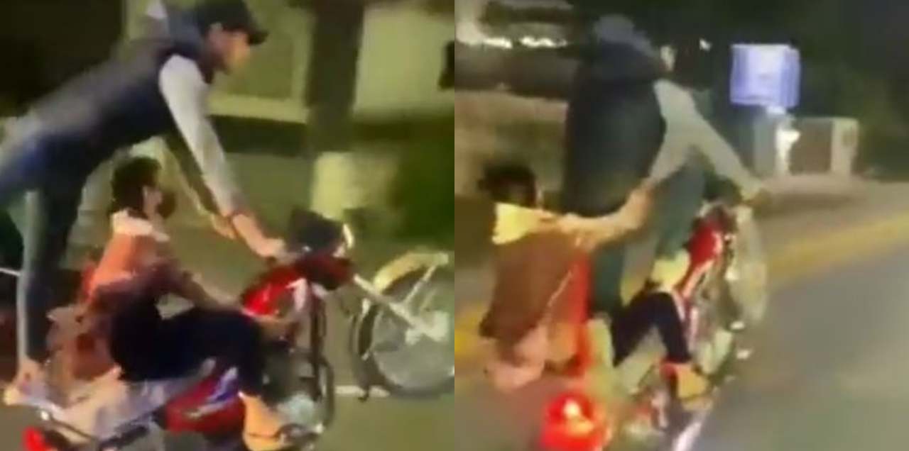 Couple Performs A One-Wheeling Stunt In Lahore